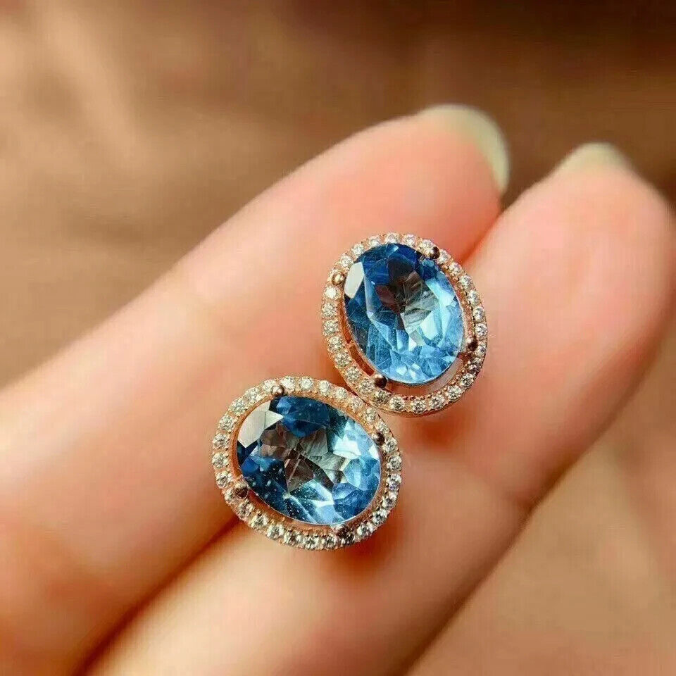 2.00Ct Oval Cut London Blue Topaz Women's Stud Earrings 14K Yellow Gold Plated